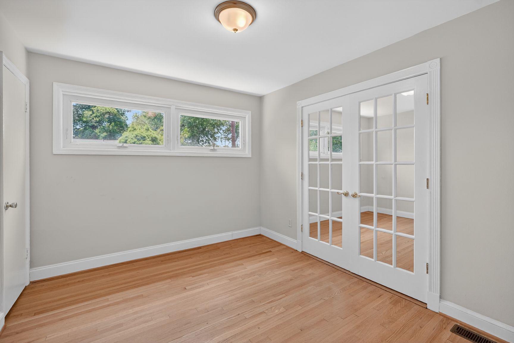 4202 Yates Road Beltsville, MD 20705 - Photo 10 of 31 Main level 4'th bedroom doubles as a home office.