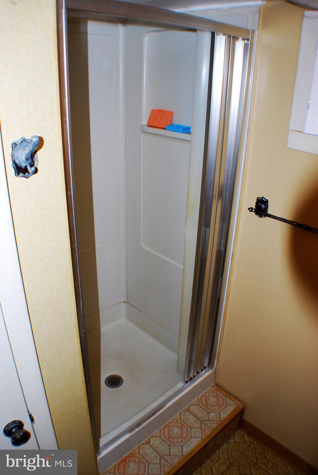 49 Harmony Hall Road Gaithersburg, MD 20877 - Photo 22 of 26 Full bathroom downstairs, view of shower.