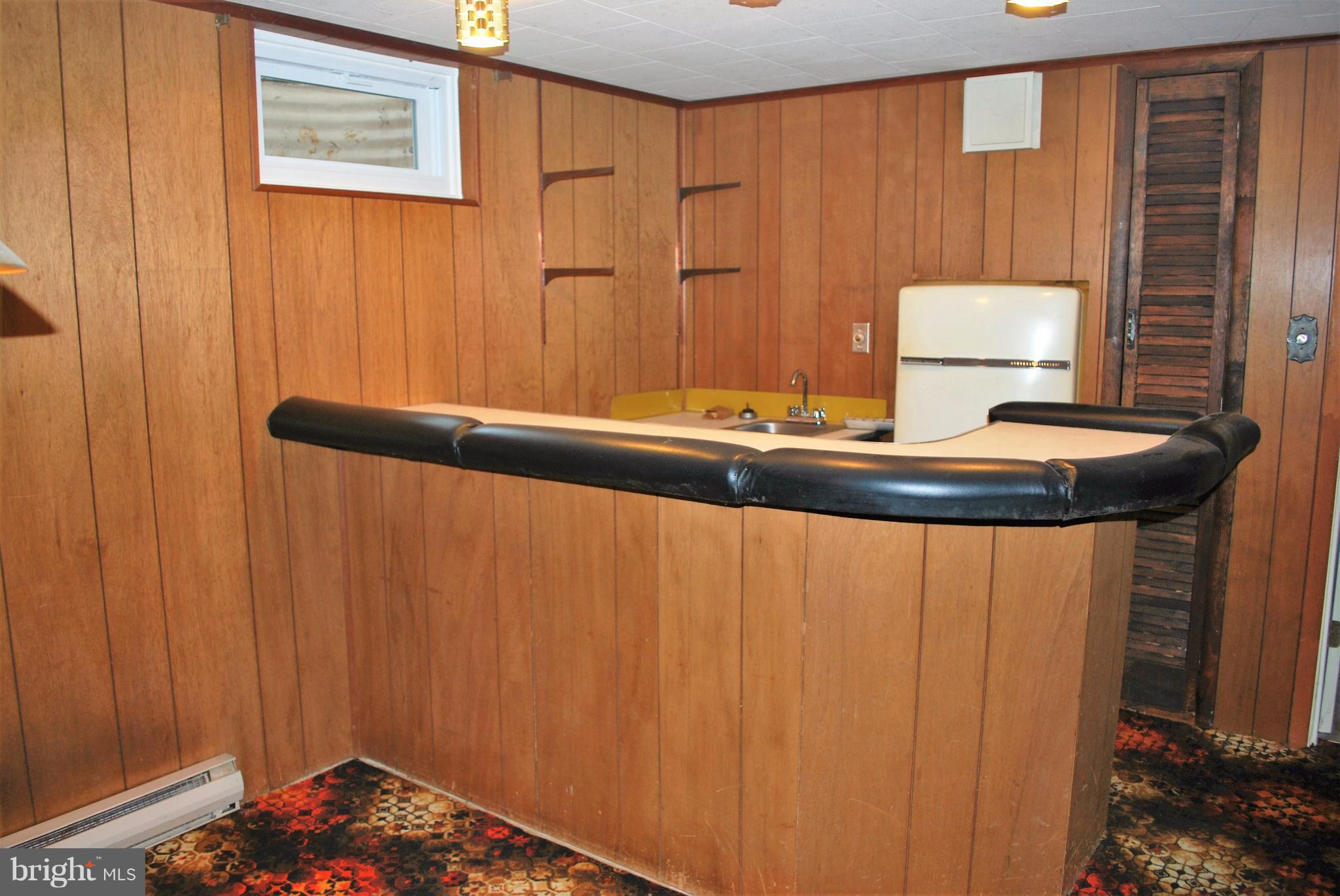 49 Harmony Hall Road Gaithersburg, MD 20877 - Photo 25 of 26 Family room close up view of bar.