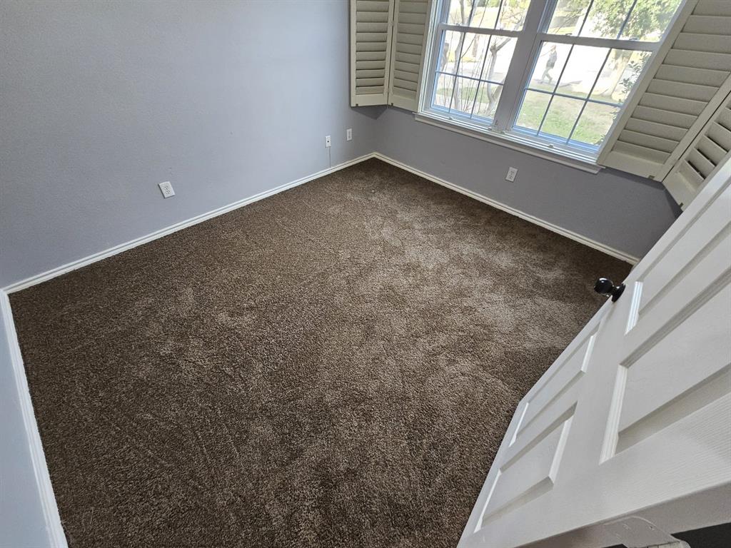 5886 Cliff Ridge Drive Dallas, TX 75249 - Photo 14 of 15 a view of balcony and window