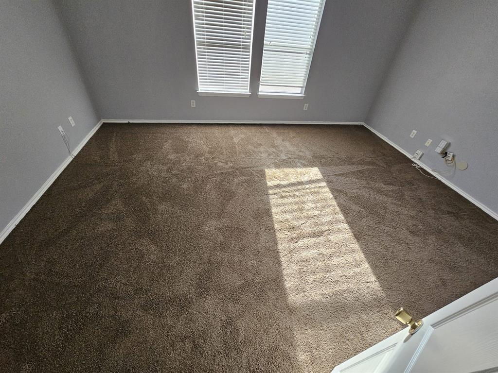 5886 Cliff Ridge Drive Dallas, TX 75249 - Photo 15 of 15 an empty room with windows