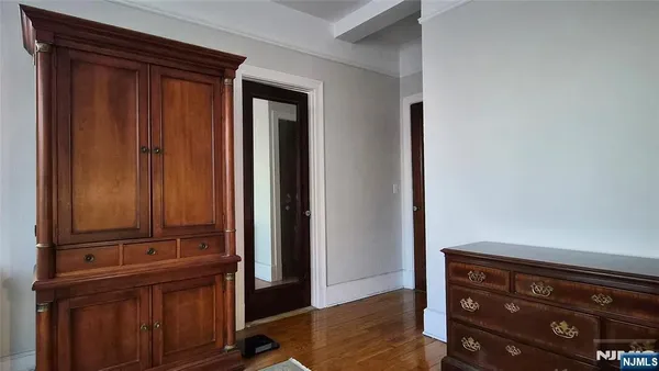 wooden floor with a wardrobe space
