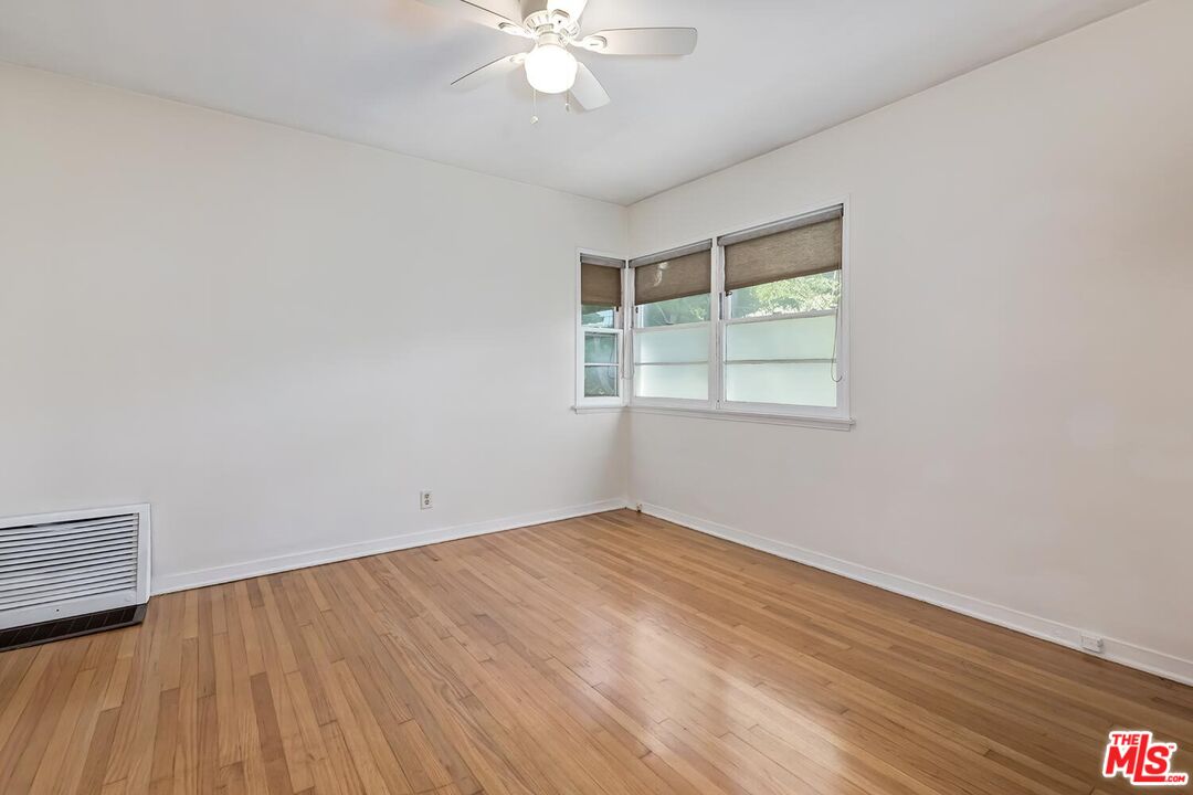 223 6th Avenue Venice, CA 90291 - Photo 14 of 39 wooden floor in an empty room with a window