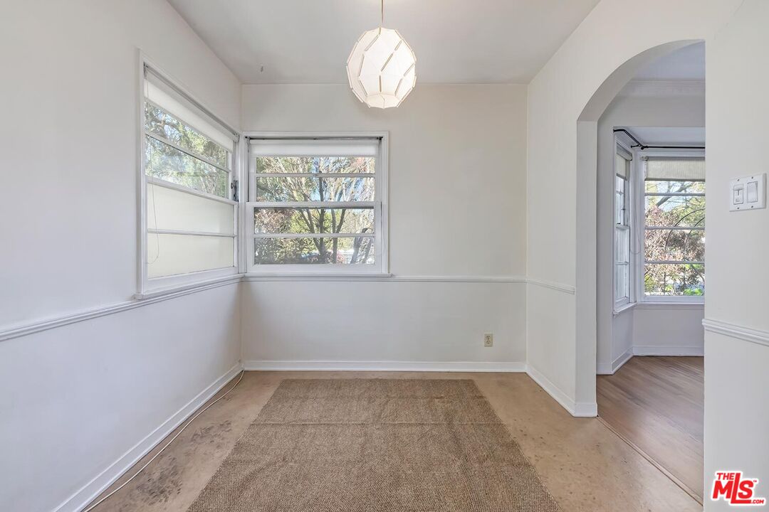 223 6th Avenue Venice, CA 90291 - Photo 39 of 39 wooden floor in an empty room with a window