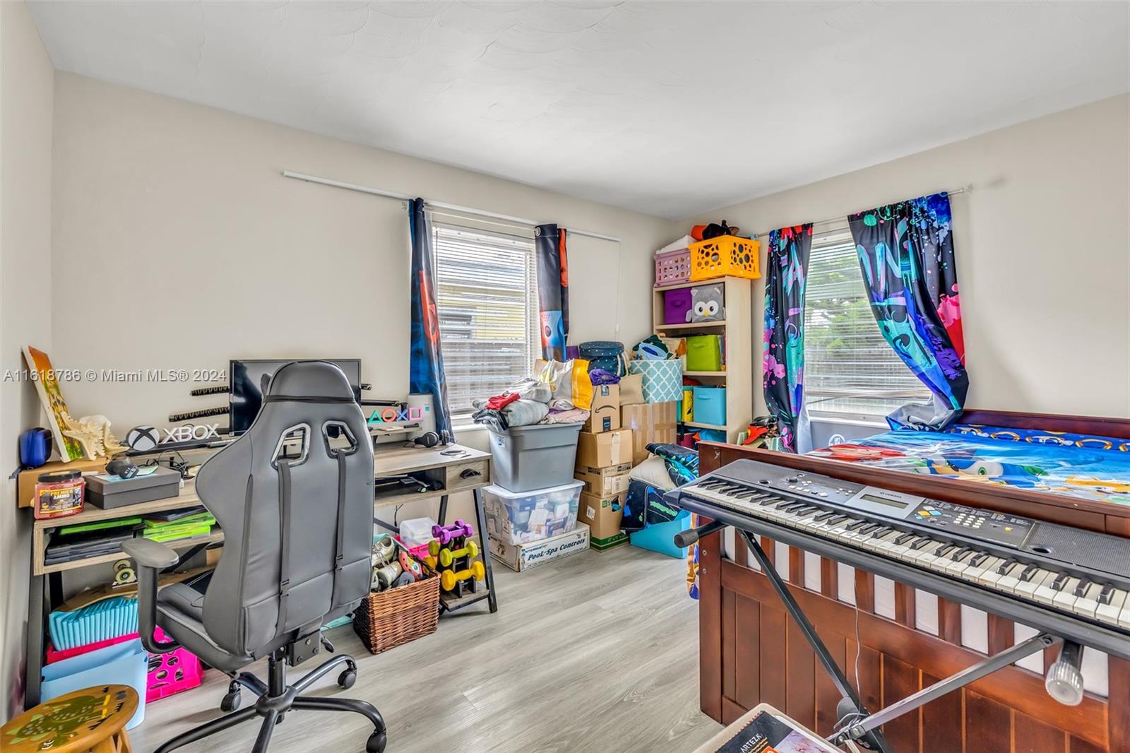 243 Southwest 9th Street Dania Beach, FL 33004 - Photo 16 of 31 a view of an empty room with toys and toys