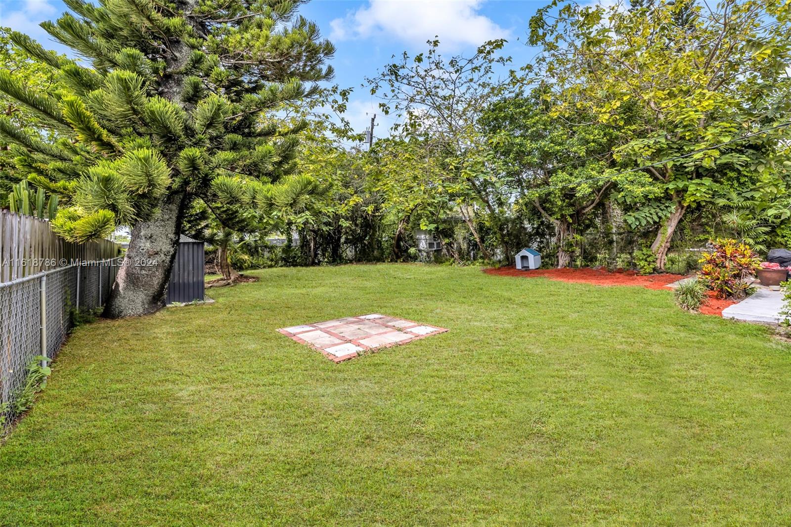 243 Southwest 9th Street Dania Beach, FL 33004 - Photo 26 of 31 a view of a golf course with a tree
