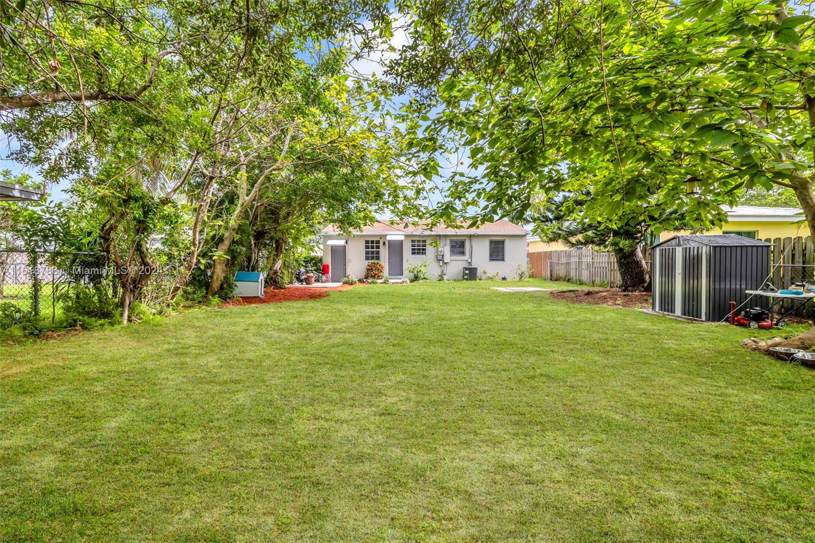 243 Southwest 9th Street Dania Beach, FL 33004 - Photo 29 of 31 a view of a house with a big yard