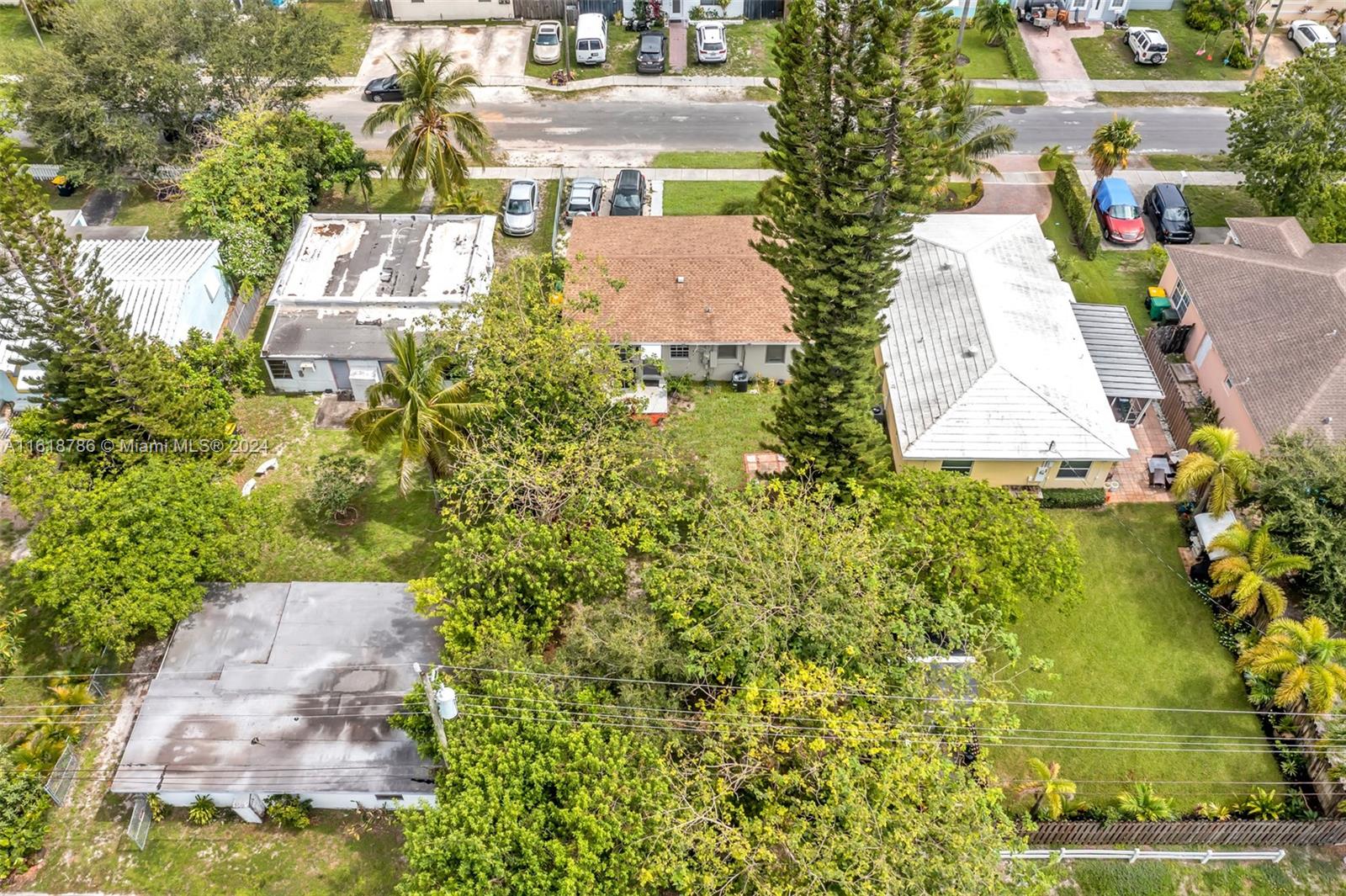 243 Southwest 9th Street Dania Beach, FL 33004 - Photo 3 of 31 an aerial view of a house with a garden