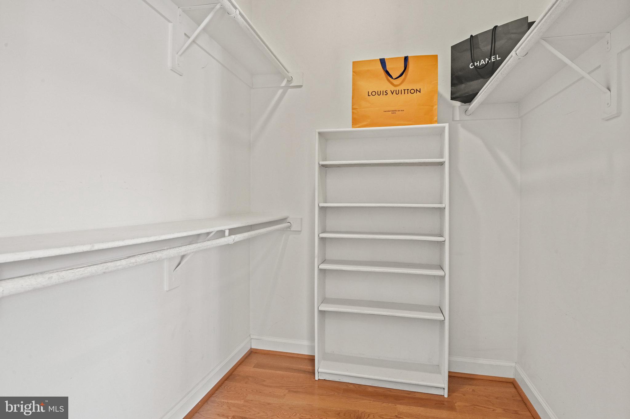 2628 Five Oaks Road Vienna, VA 22181 - Photo 21 of 29 a view of walk in closet with empty racks