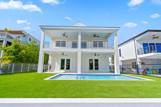a view of a house with a swimming pool