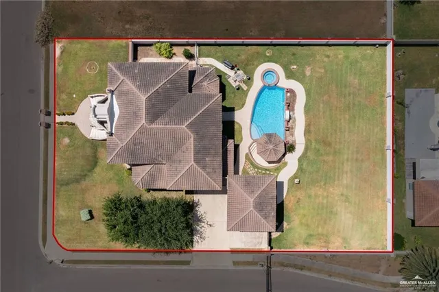 a view of a tiny house with a yard