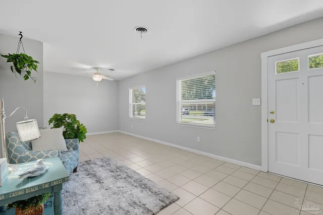 a view of an entryway with flower pot