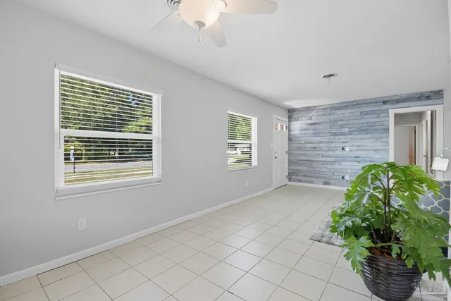 a large white room with windows