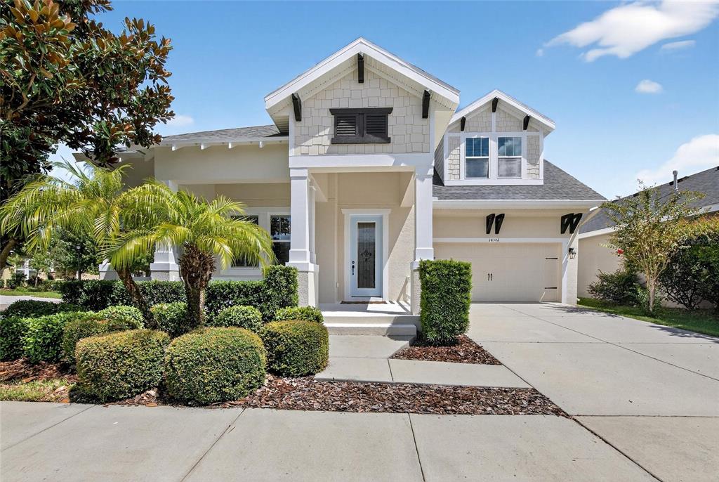 14302 Rolling Dune Road Lithia, FL 33547 - Photo 1 of 1 a front view of a house with garden