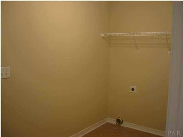 5331 Cox Road Milton, FL 32583 - Photo 3 of 15 laundry room right off kitchen