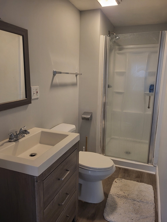 89 Oak Street Fall River, MA 02720 - Photo 5 of 39 a bathroom with a sink a toilet and shower