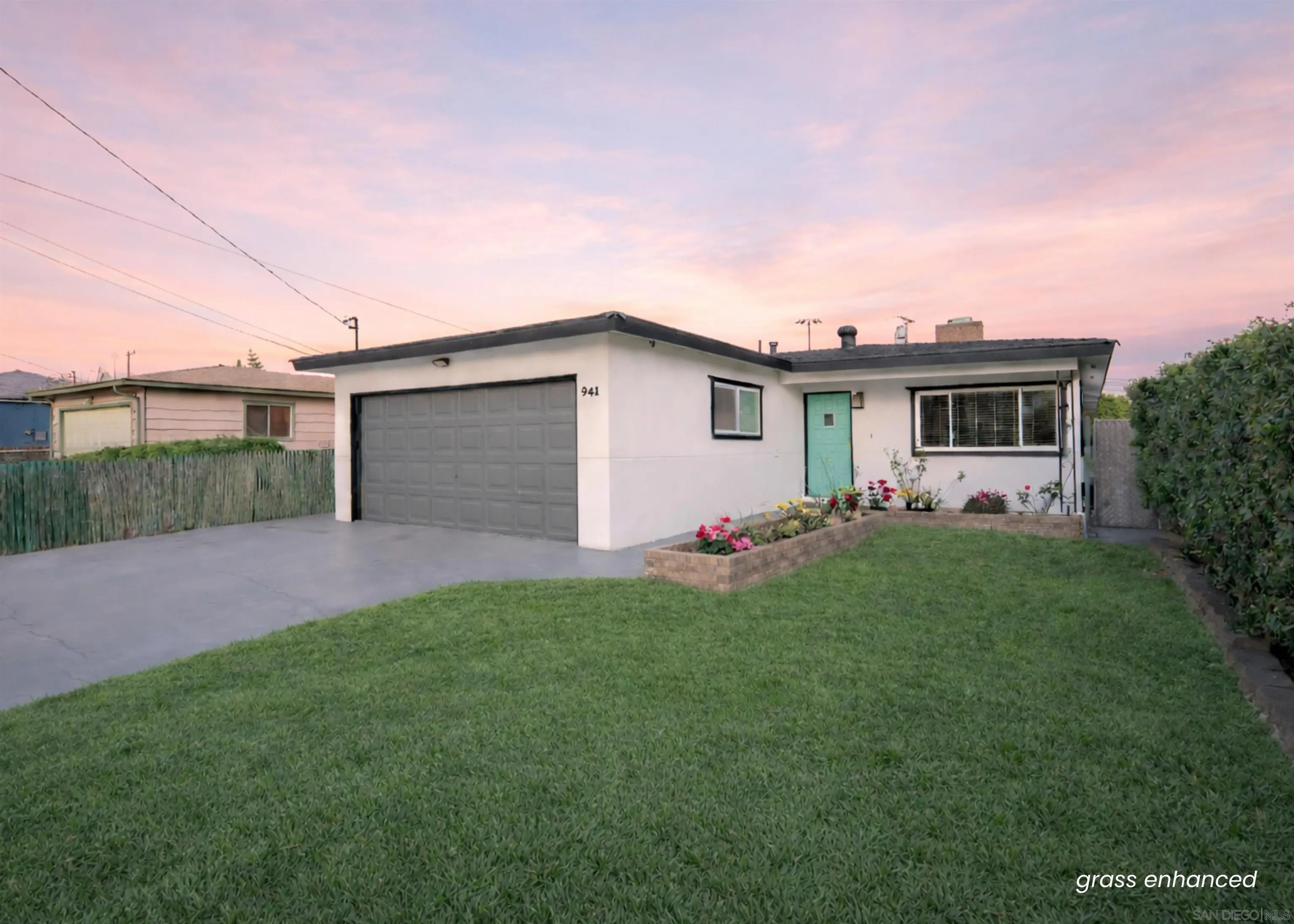 941 8th Street Imperial Beach, CA 91932 - Photo 2 of 22 a front view of house with yard and outdoor seating