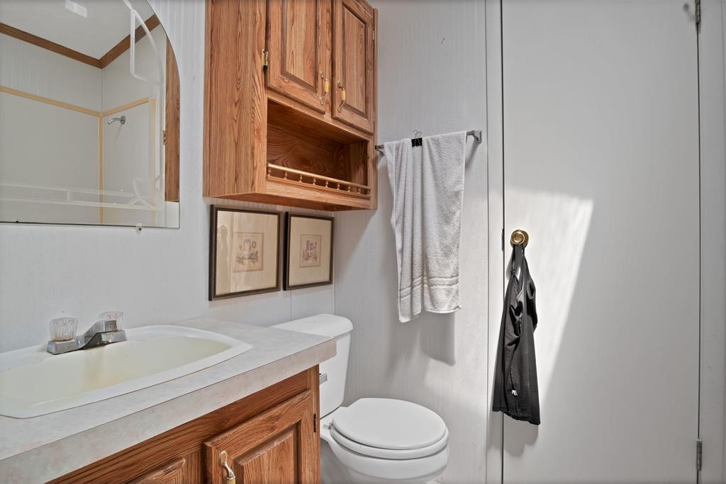 318 Bavarian Road Waco, TX 76705 - Photo 20 of 26 a bathroom with a sink a toilet and shower