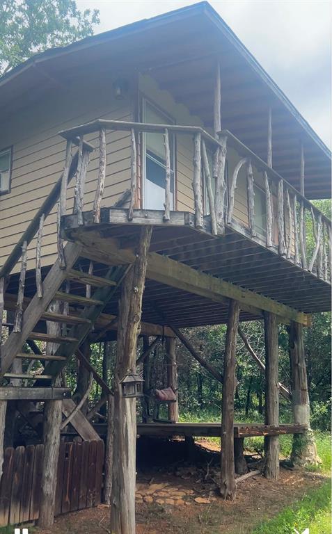 318 Bavarian Road Waco, TX 76705 - Photo 25 of 26 a view of house with wooden deck and furniture