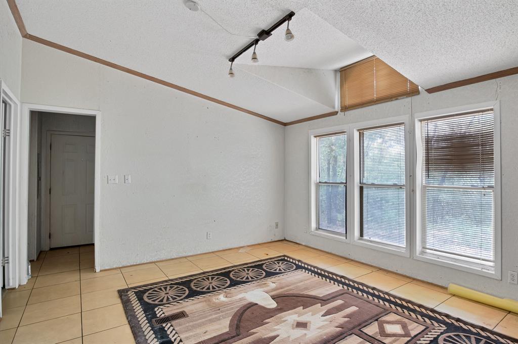 318 Bavarian Road Waco, TX 76705 - Photo 10 of 26 a view of an empty room and window