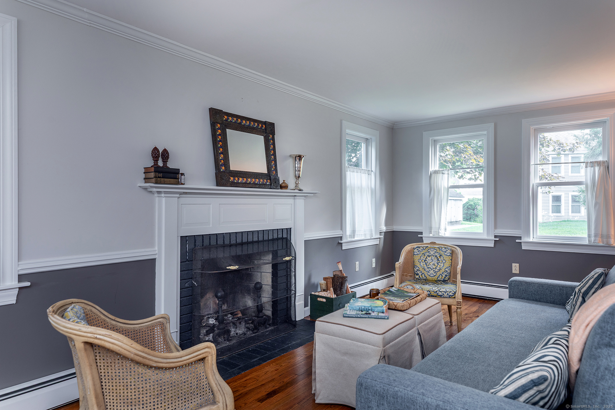 87 Canaan Road, Unit 2G Salisbury, CT 06068 - Photo 12 of 30 a living room with furniture a fireplace and window