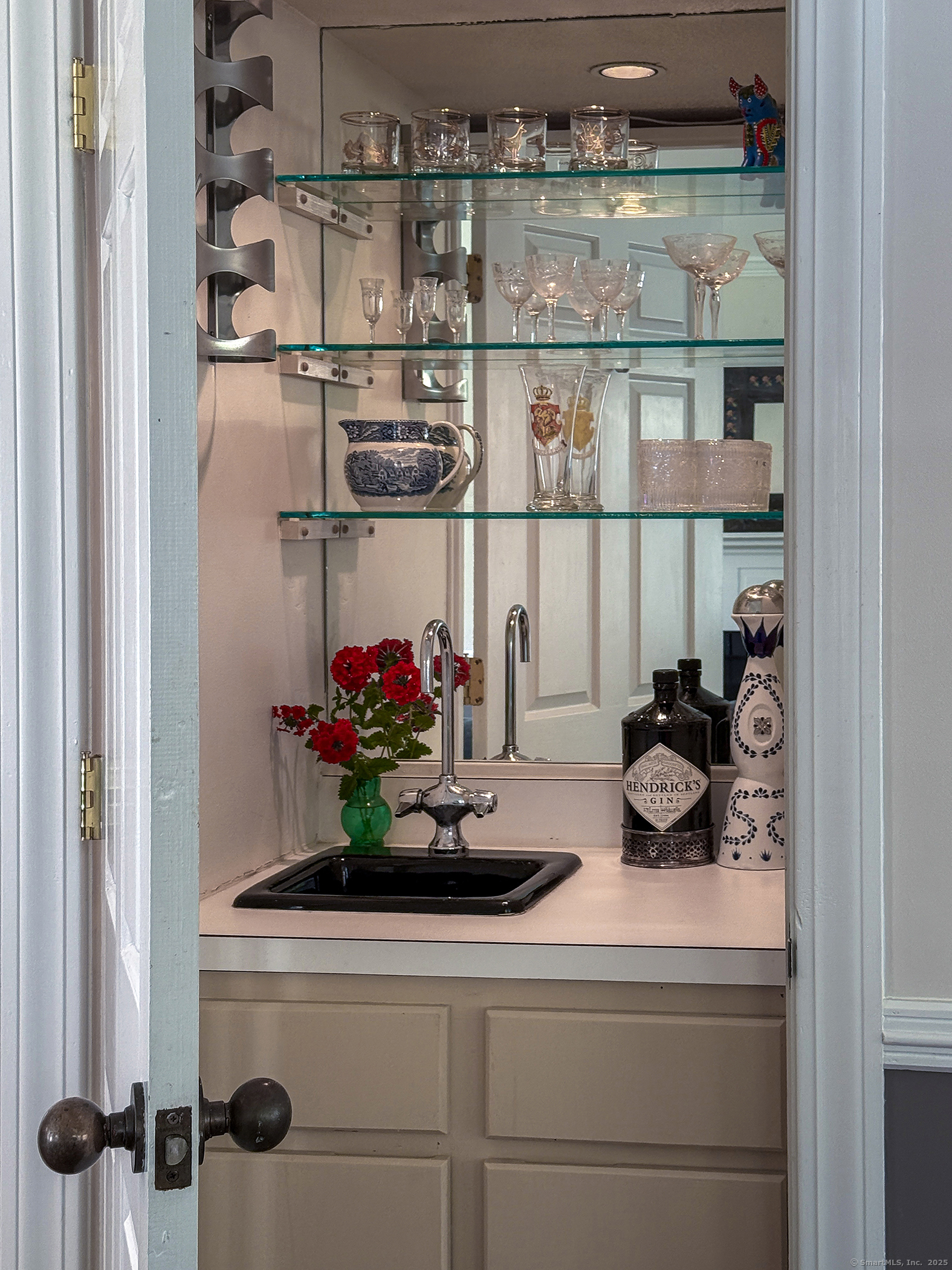 87 Canaan Road, Unit 2G Salisbury, CT 06068 - Photo 13 of 30 a kitchen with a refrigerator and cabinets