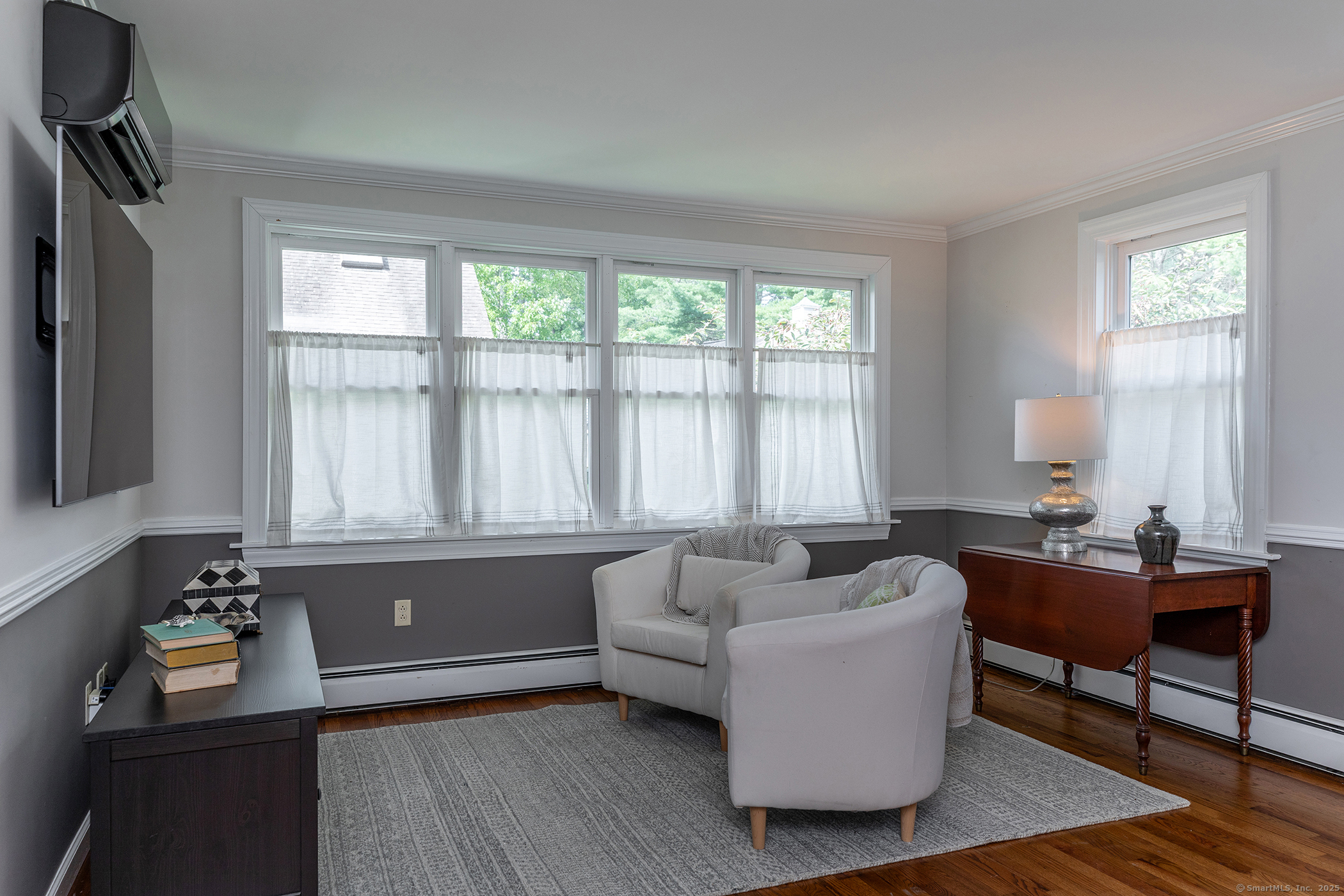 87 Canaan Road, Unit 2G Salisbury, CT 06068 - Photo 14 of 30 a living room with furniture and two window