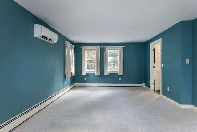 a bathroom with a sink vanity and a mirror