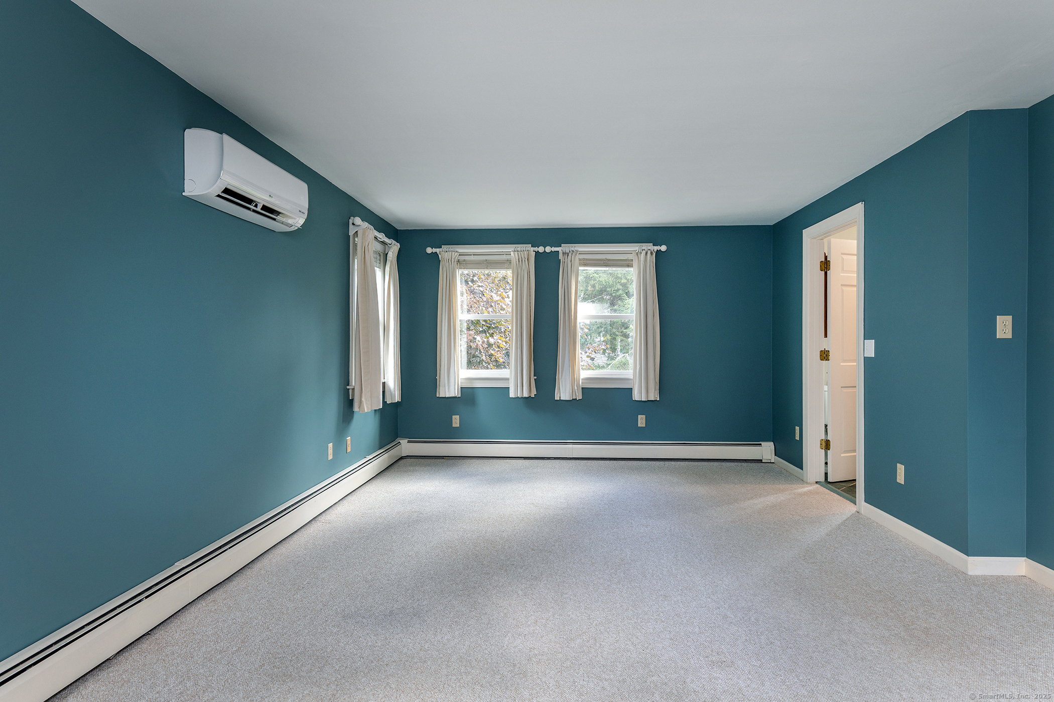 87 Canaan Road, Unit 2G Salisbury, CT 06068 - Photo 18 of 30 an empty room with windows