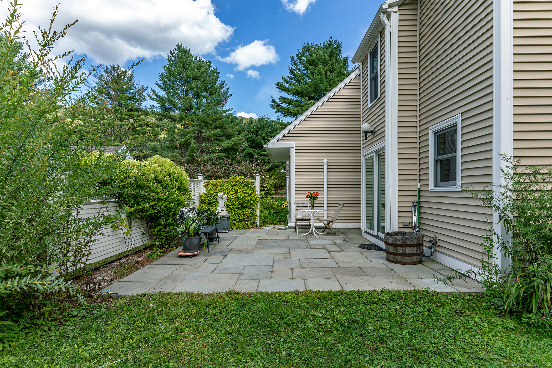 87 Canaan Road, Unit 2G Salisbury, CT 06068 - Photo 23 of 30 a view of a house with a yard