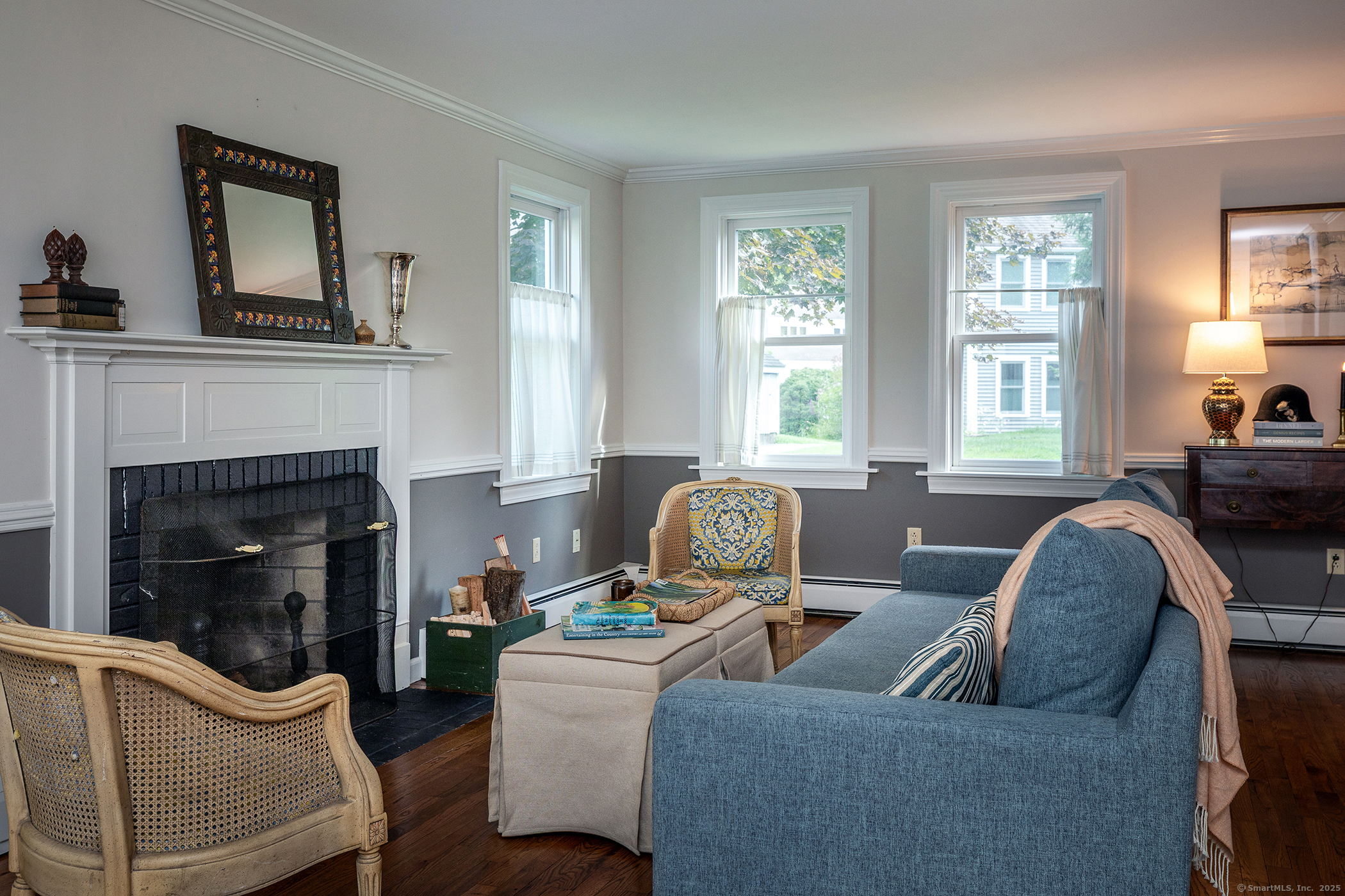 87 Canaan Road, Unit 2G Salisbury, CT 06068 - Photo 10 of 30 a living room with furniture and a fireplace