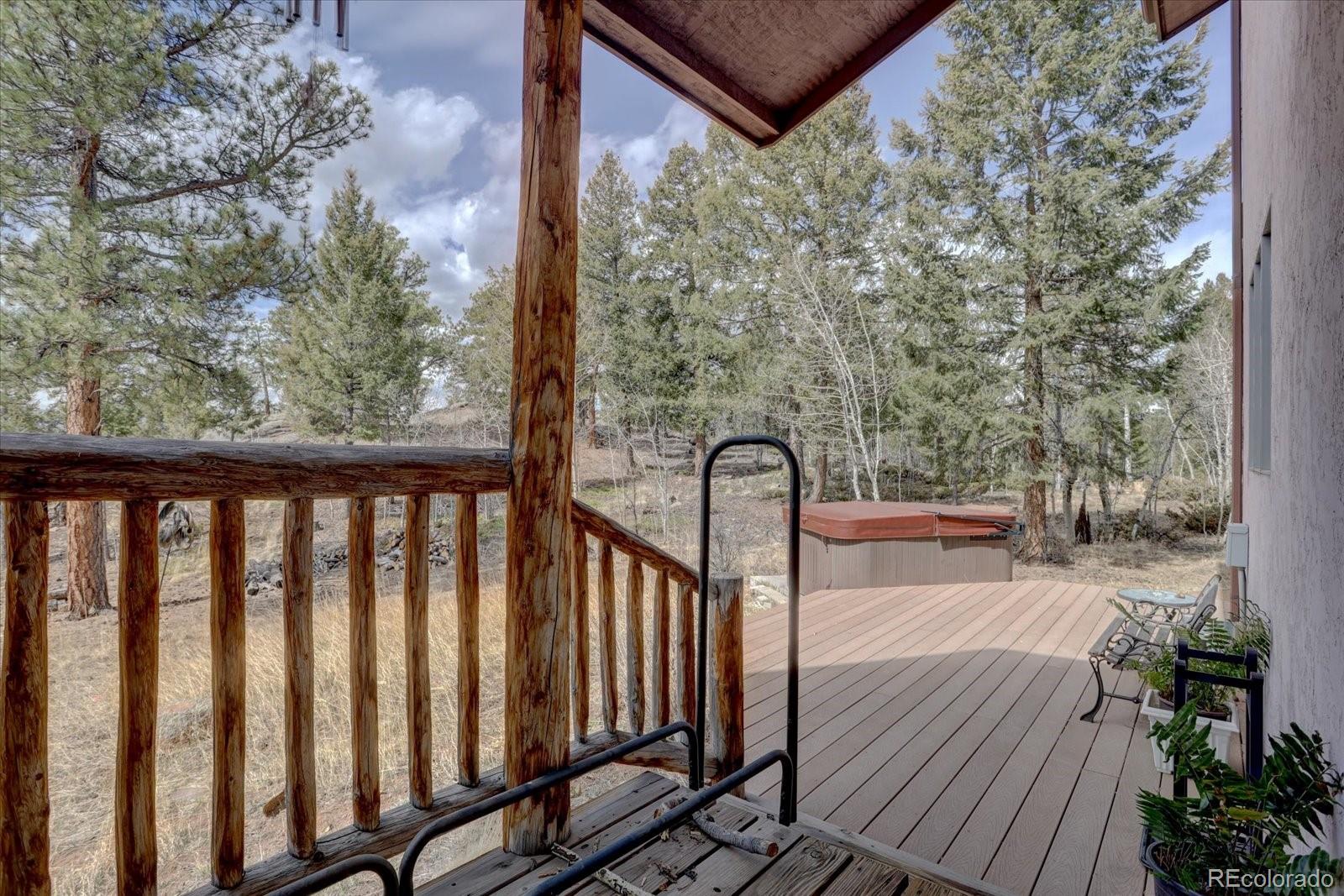 12227 Calfee Gulch Road Conifer, CO 80433 - Photo 34 of 43 a view of balcony with wooden floor