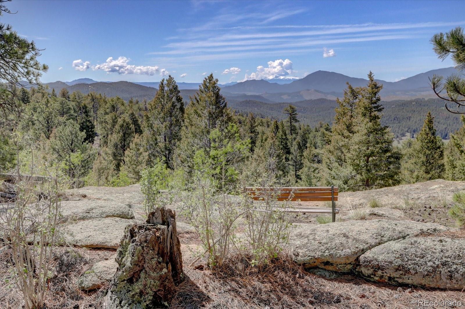 12227 Calfee Gulch Road Conifer, CO 80433 - Photo 37 of 43 a view of a outdoor space with mountain view