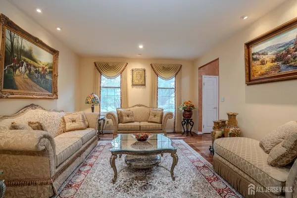 a living room with furniture or couch and a fireplace