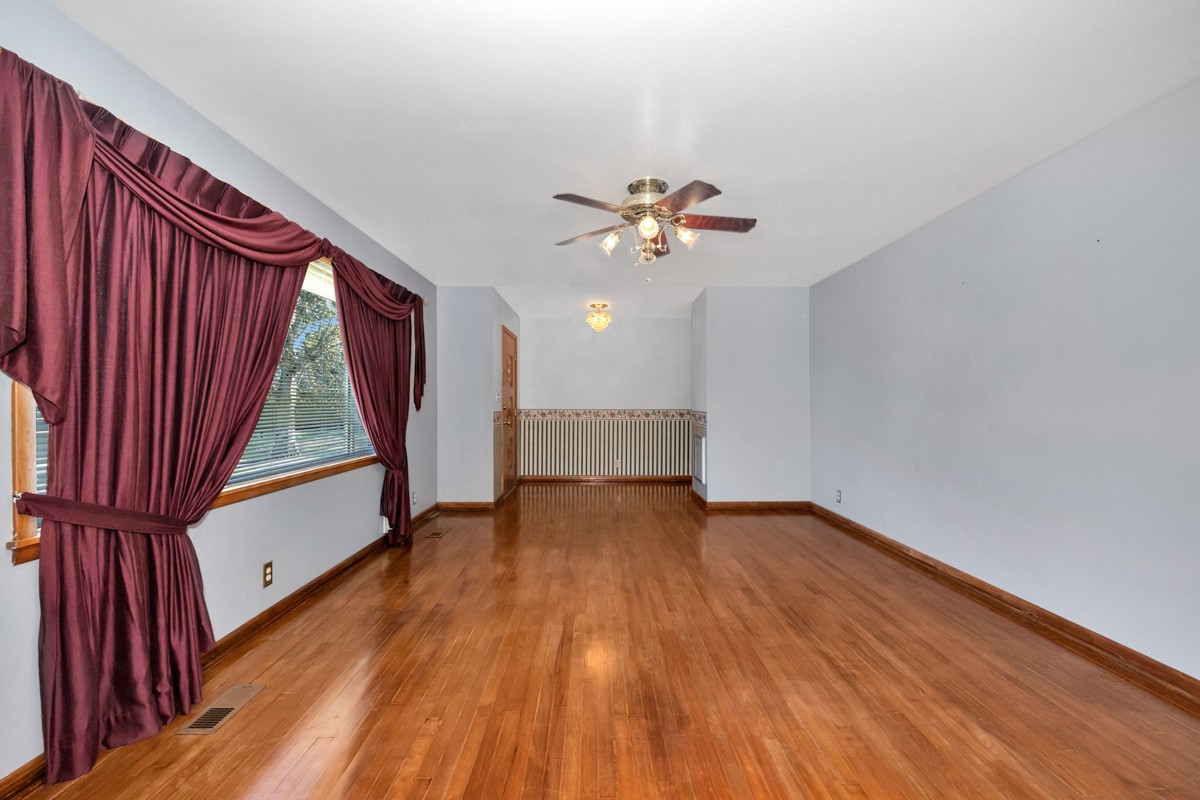 40 Blanche Road Taft, TN 38488 - Photo 3 of 38 wooden floor in an empty room with a window