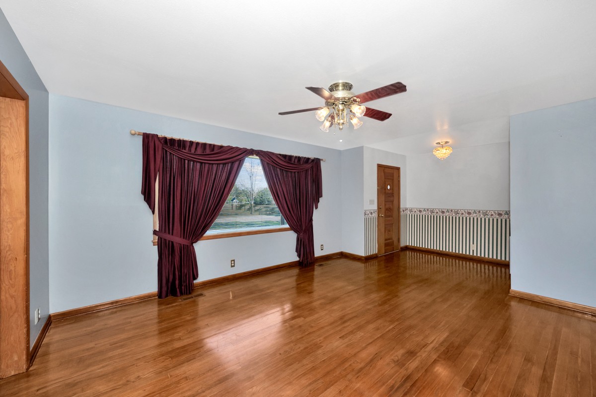 40 Blanche Road Taft, TN 38488 - Photo 4 of 38 wooden floor in an empty room with a window