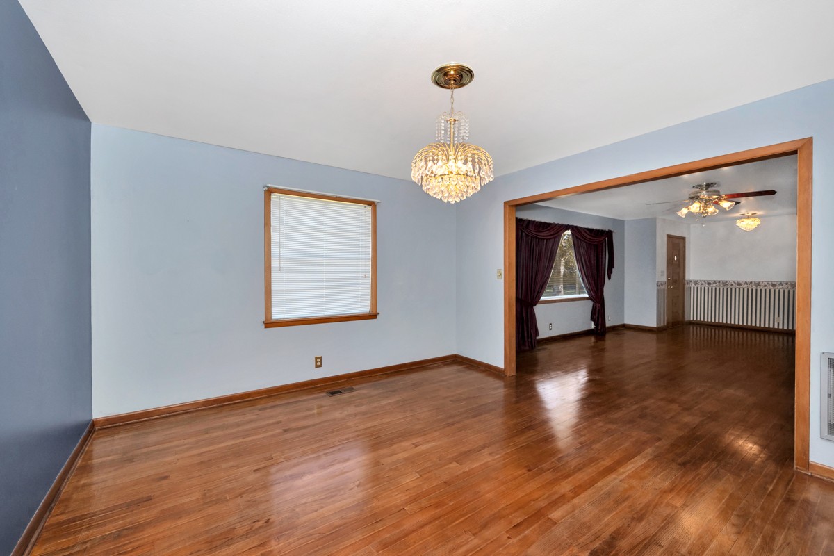 40 Blanche Road Taft, TN 38488 - Photo 7 of 38 a view of an empty room with wooden floor and a window