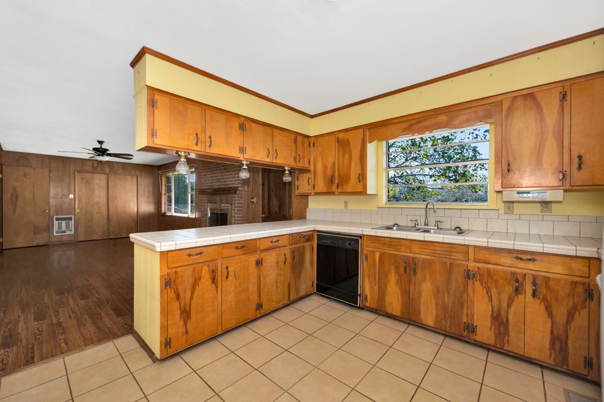 40 Blanche Road Taft, TN 38488 - Photo 9 of 38 a kitchen with stainless steel appliances granite countertop a sink and a stove