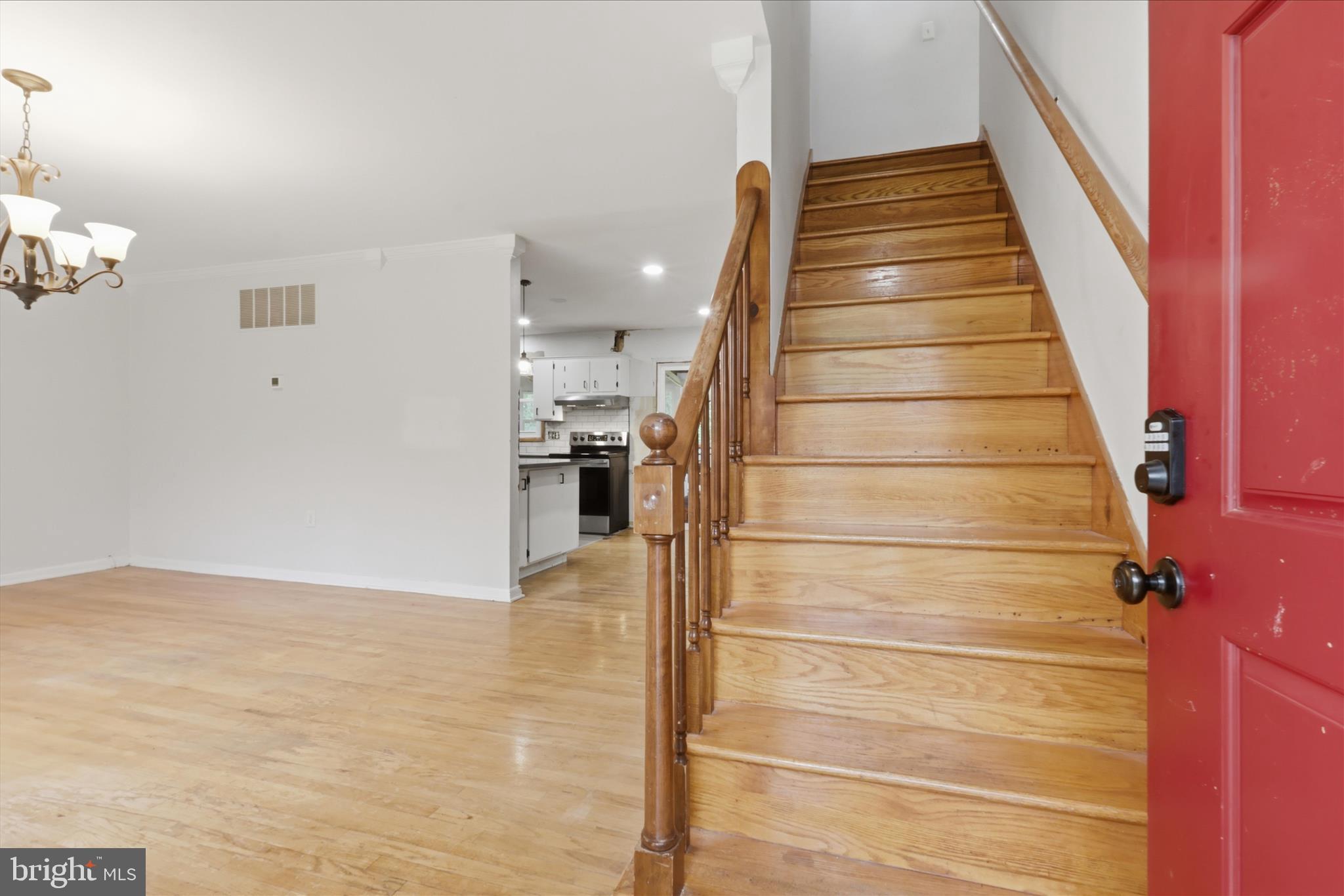 9304 Liberty Court Frederick, MD 21701 - Photo 12 of 49 a view of entryway with wooden floor