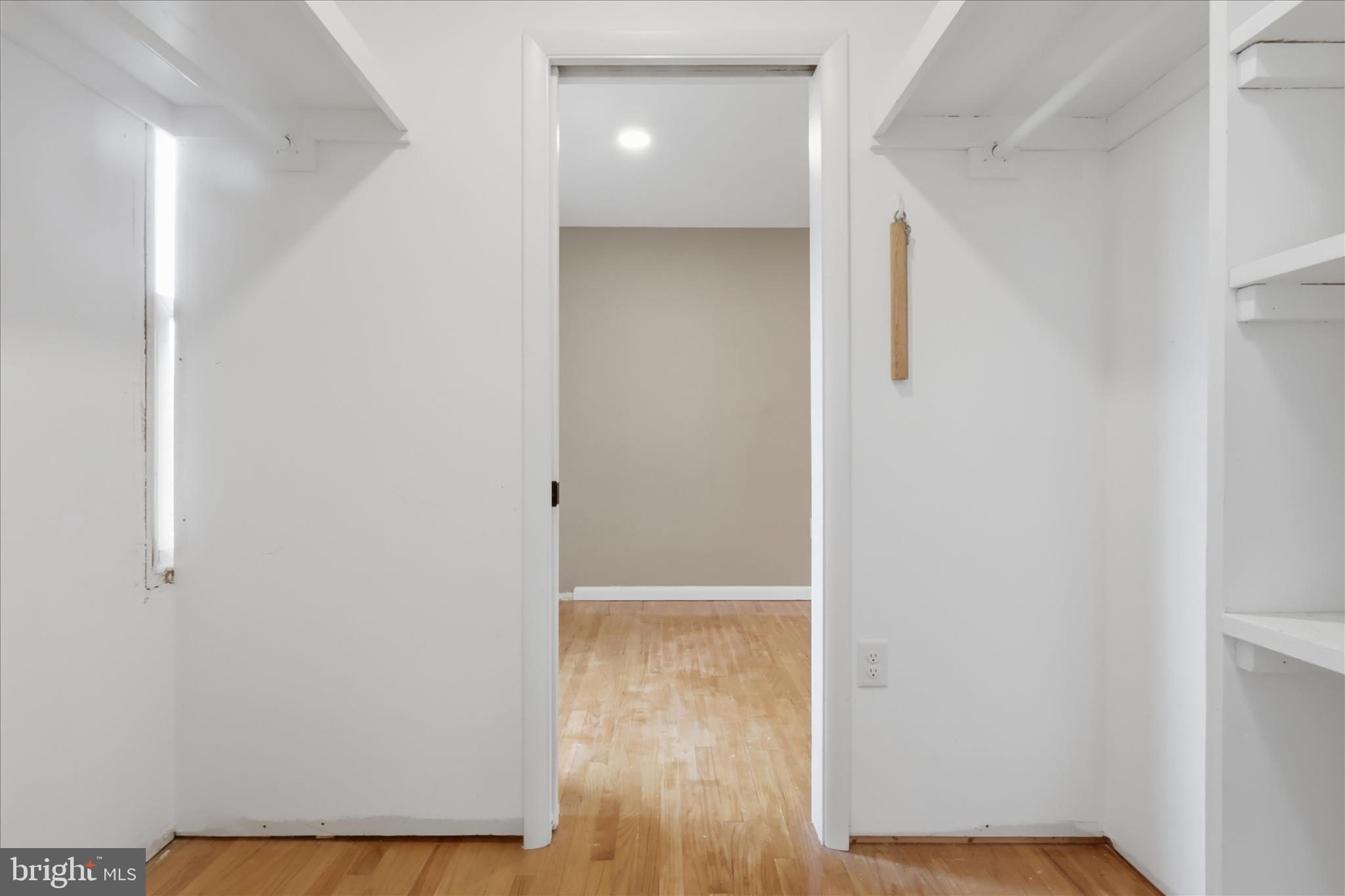 9304 Liberty Court Frederick, MD 21701 - Photo 31 of 49 a view of a room with wooden floor