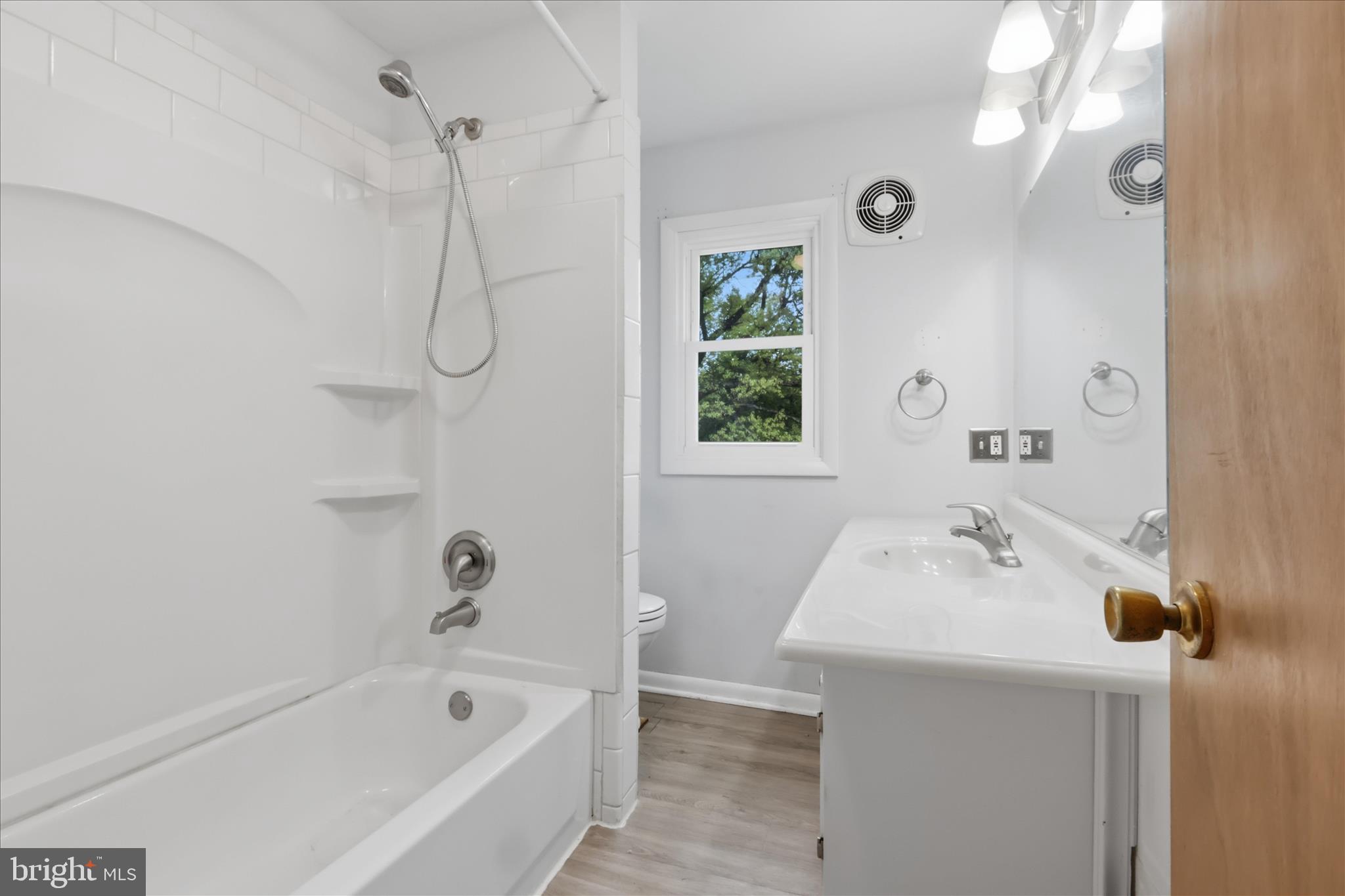 9304 Liberty Court Frederick, MD 21701 - Photo 32 of 49 a bathroom with a sink vanity tub and shower
