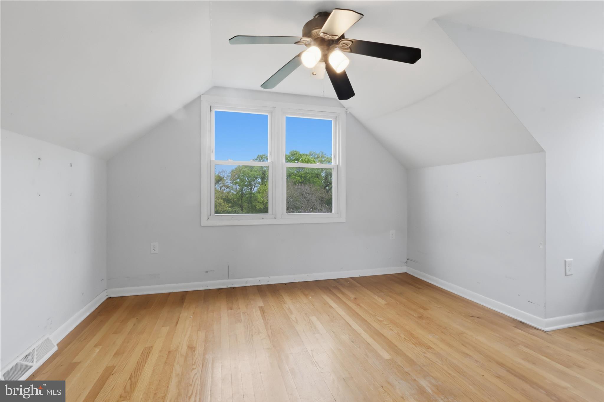 9304 Liberty Court Frederick, MD 21701 - Photo 33 of 49 wooden floor in an empty room with a window
