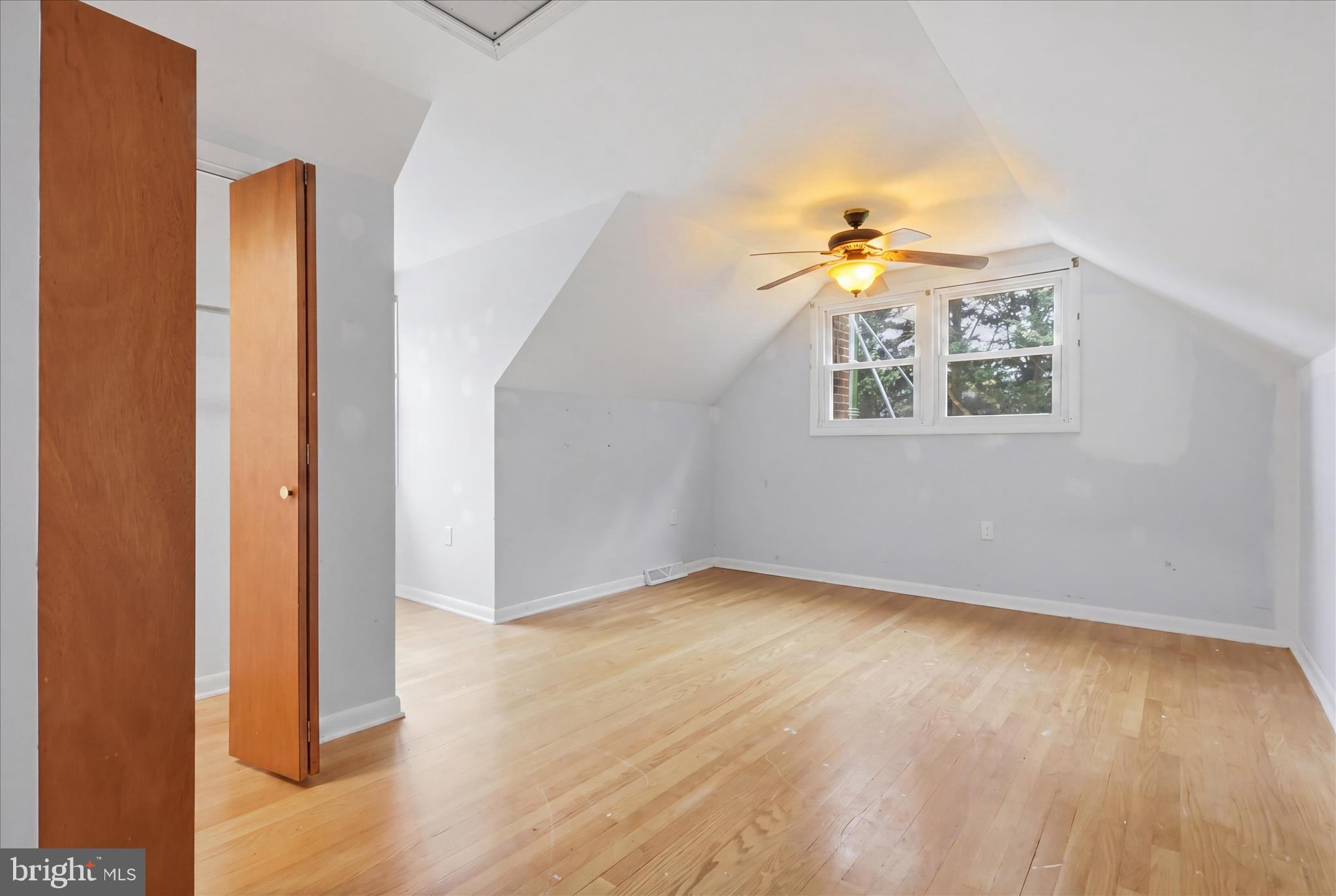 9304 Liberty Court Frederick, MD 21701 - Photo 35 of 49 wooden floor in an empty room with a window