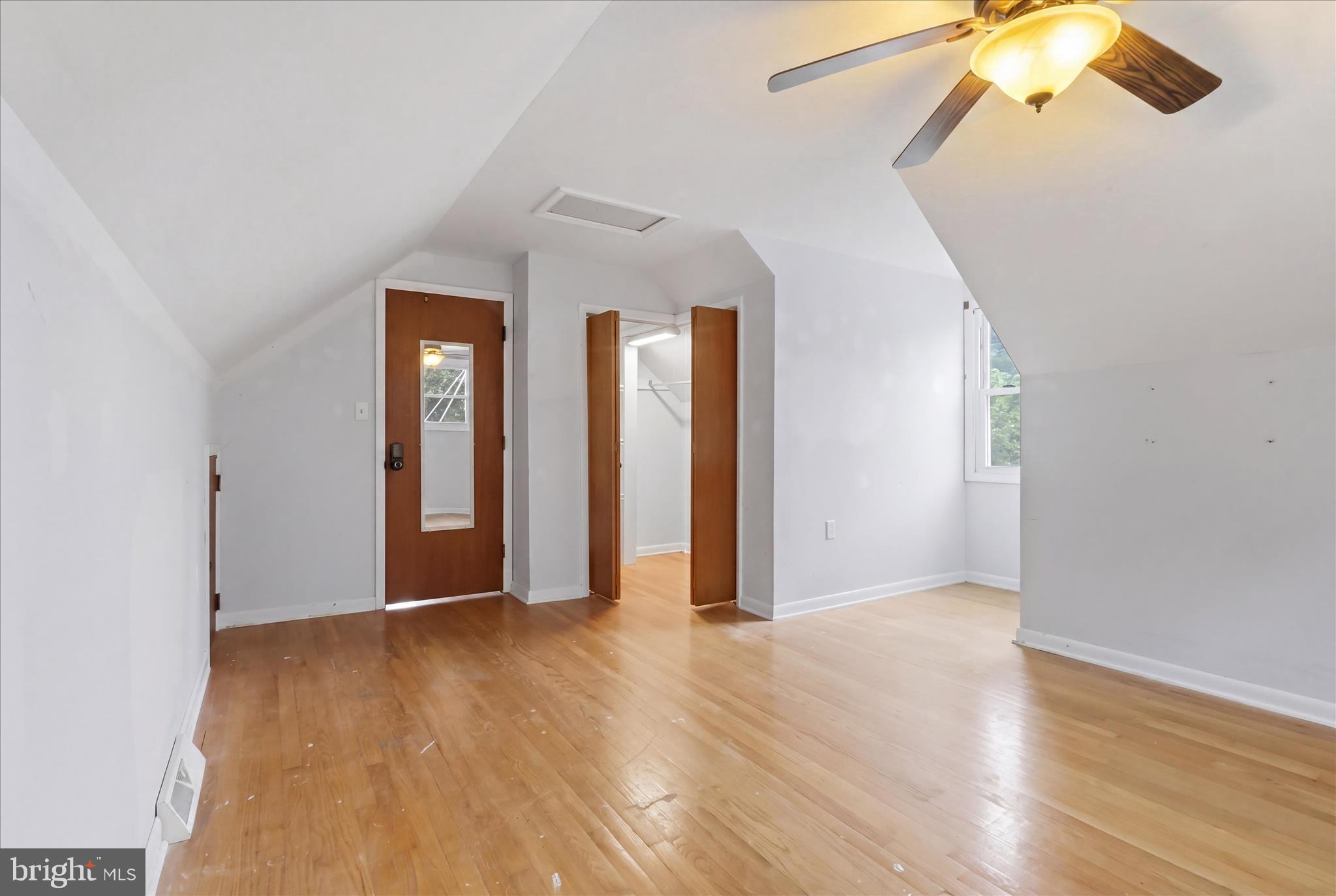 9304 Liberty Court Frederick, MD 21701 - Photo 36 of 49 wooden floor in an empty room with a window