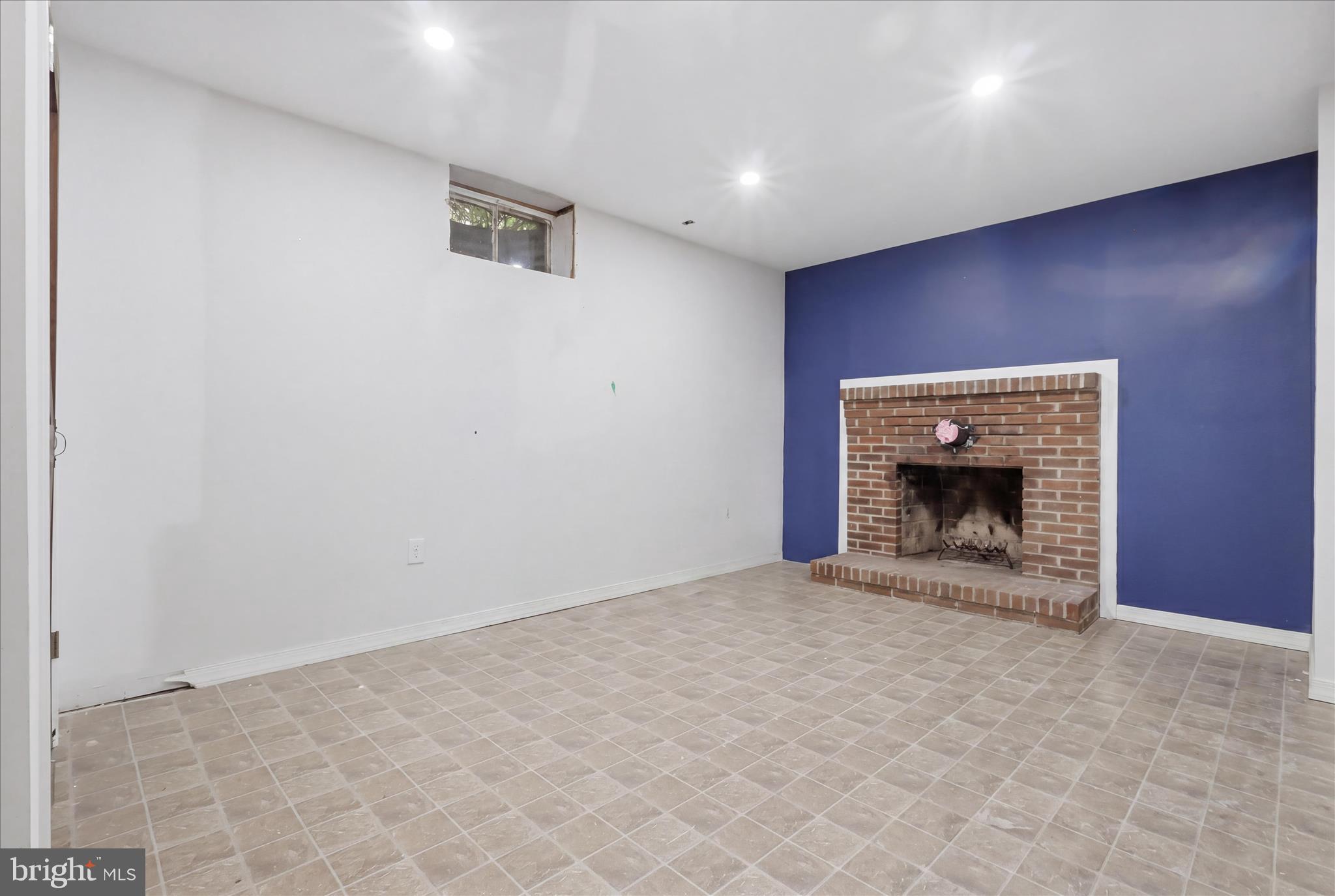 9304 Liberty Court Frederick, MD 21701 - Photo 40 of 49 an empty room with a fireplace