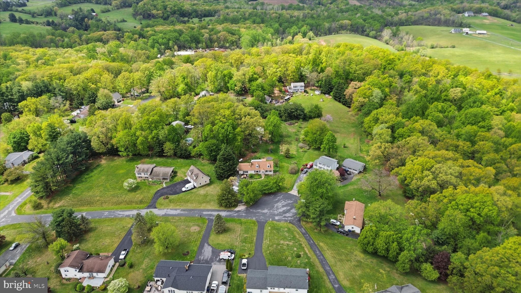 9304 Liberty Court Frederick, MD 21701 - Photo 6 of 49 an aerial view of a residential houses with yard and lake view