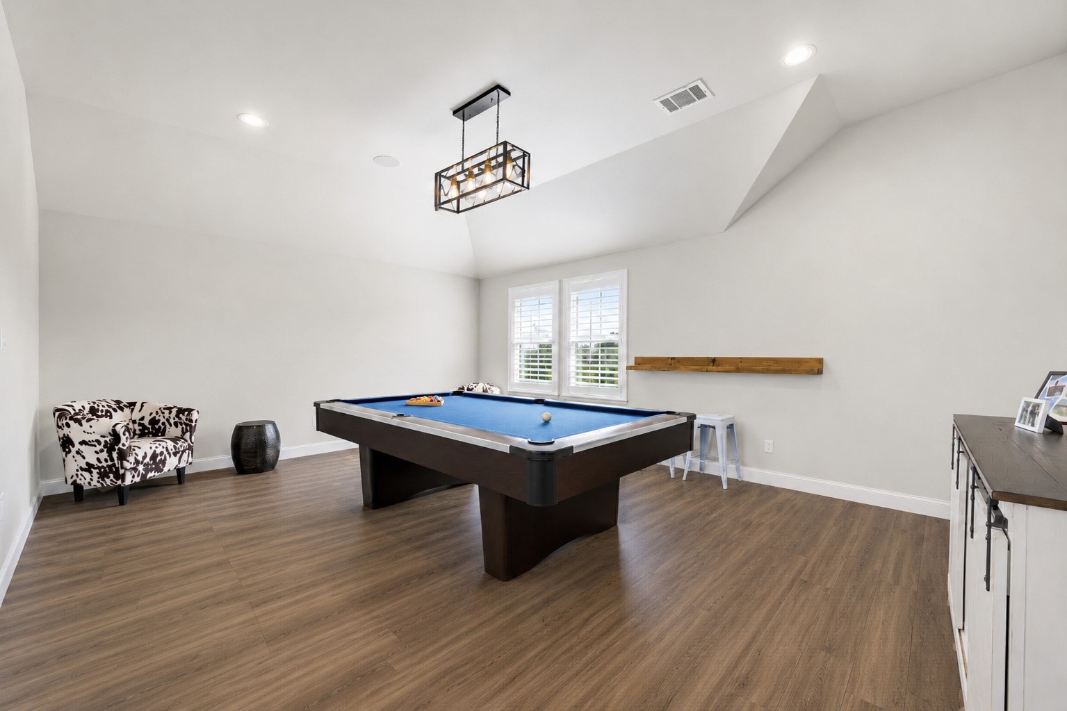 629 Germander Road Leander, TX 78641 - Photo 23 of 38 a room with wooden floor and pool table