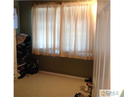 2 Overview Court Edison, NJ 08817 - Photo 22 of 25 a room that has a bed in it
