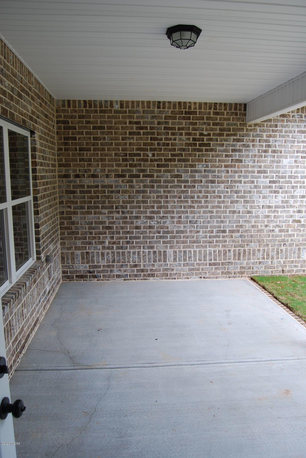 65 Carters Way Forsyth, GA 31029 - Photo 11 of 13 a bathroom with a shower
