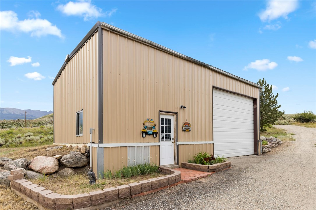 6015 Heeney Road Silverthorne, CO 80498 - Photo 32 of 35 3 plus car garage with storage lift and workshop.